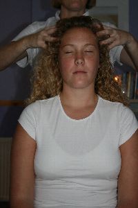 An image of a client undergoing an Indian Head Massage Treatment